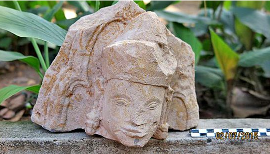 Pictured is the head of a Bayon-era statue that was found in Siem Reap’s Kokchak commune by a farmer earlier this week while he was working in a field. APSARA AUTHORITY